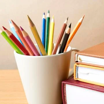 Stack of book with color pencil Stock Photos