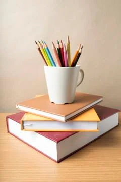 Stack of book with color pencil Stock Photos