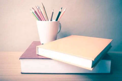 Stack of book with color pencil Stock Photos