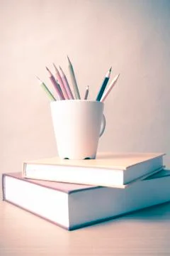 Stack of book with color pencil Stock Photos