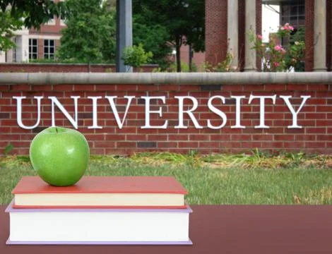 Stack of book in the front of university Stock Photos