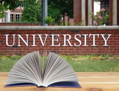 Stack of book in the front of university Stock Photos
