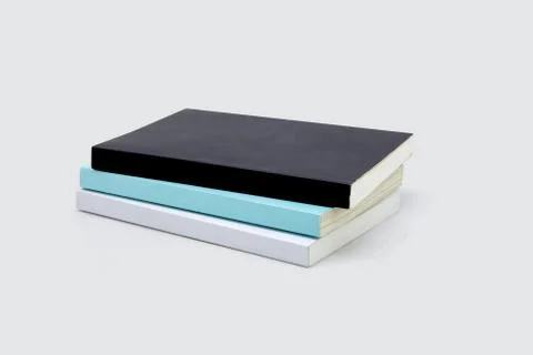 Stack of book isolated on white background, notebook and textbook, heap of st Stockfoto's