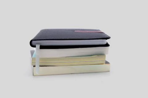 Stack of book isolated on white background, notebook and textbook, heap of st Foto stock