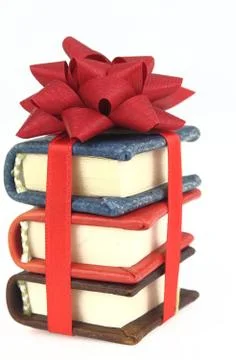 Stack of book with ribbon Stock Photos