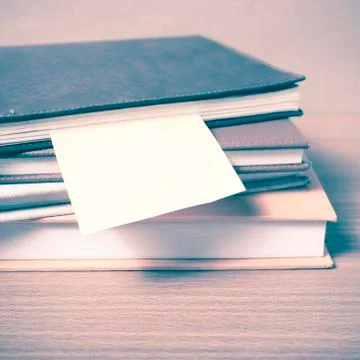 Stack of book with sticky note vintage style Stock Photos