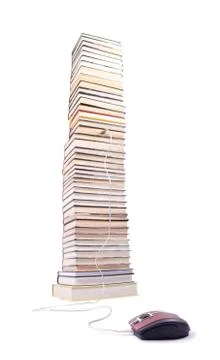 Stack of books and a computer mouse Stock Photos