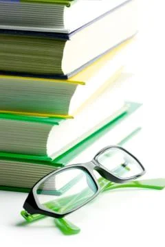 Stack of books and glasses Stock Photos