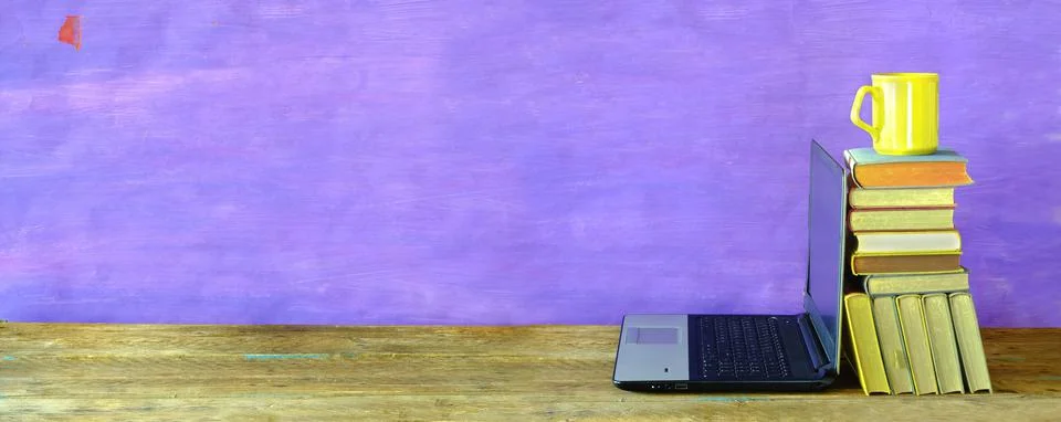 Stack of books and laptop computer,home office, homeschooling,reading Stock Photos