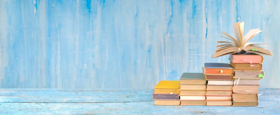 Stack of books and open book. Reading,literature,education,library, copy space Stock Photos