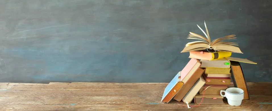 Stack of books and open book. Reading,literature,education,home office Stock Photos