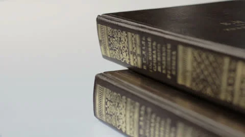 Stack of Books and opened one. Stock Footage 25797995