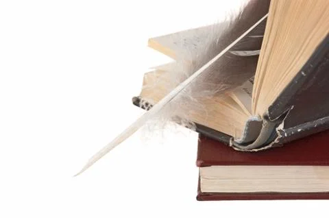 Stack of books and quill Foto stock