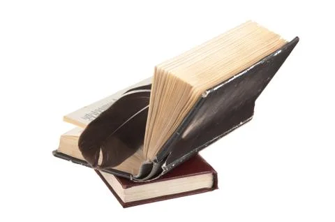 Stack of books and quill 스톡 사진