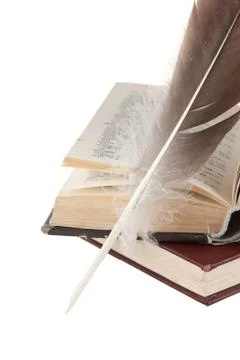 Stack of books and quill 스톡 사진