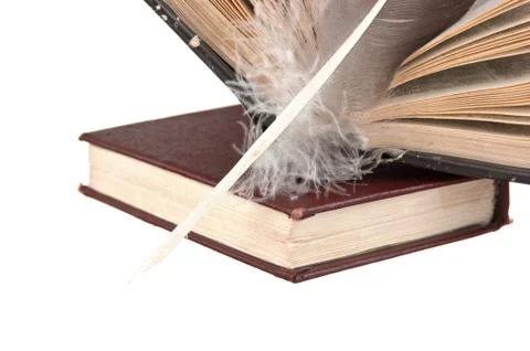 Stack of books and quill Stock Photos
