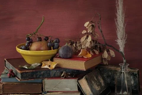 Stack of books and various atumn treasures, autumn book fair,litertaure,rel.. Stock Photos