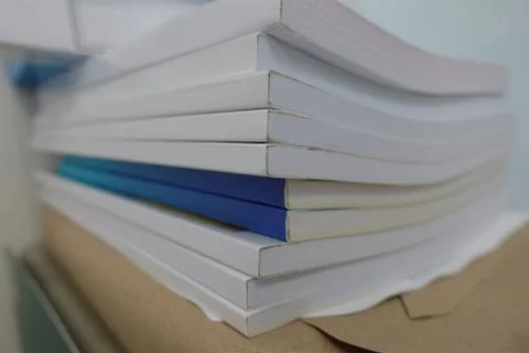 Stack of books for annual Report Stock Photos