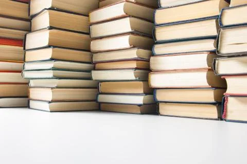 Stack of books background. many books piles. Stock Photos