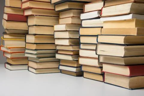Stack of books background. many books piles. Stock Photos