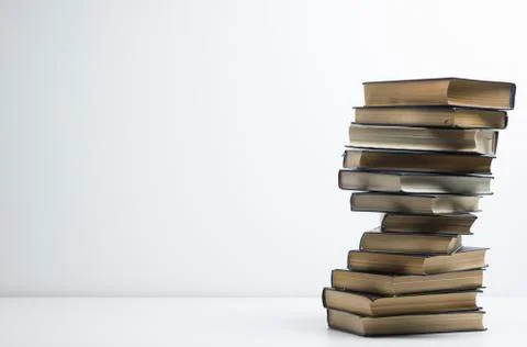 Stack of books background. many books piles. Photos