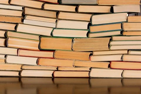 Stack of books background. many books piles Stock Photos