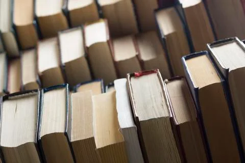 Stack of books background. many books piles. Stock Photos
