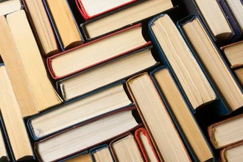 Stack of books background. many books piles. Stock Photos
