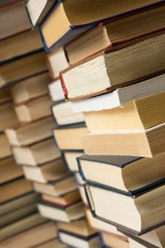 Stack of books background. many books piles. Stock Photos