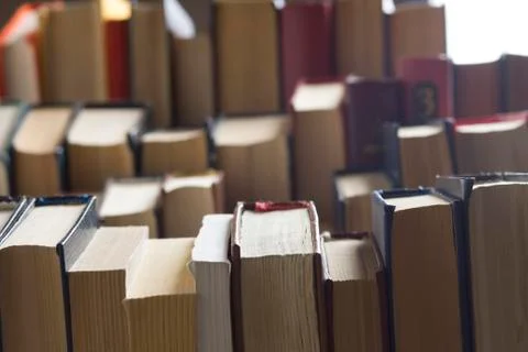 Stack of books background. many books piles. Stock Photos
