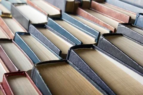 Stack of books background. many books piles. Stock Photos