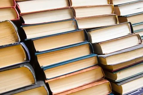 Stack of books background. many books piles. 库存照片