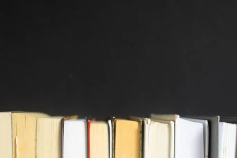 Stack of books on black background Stock Photos
