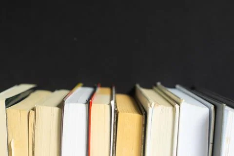 Stack of books on black background Stock Photos