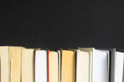 Stack of books on black background Stock Photos