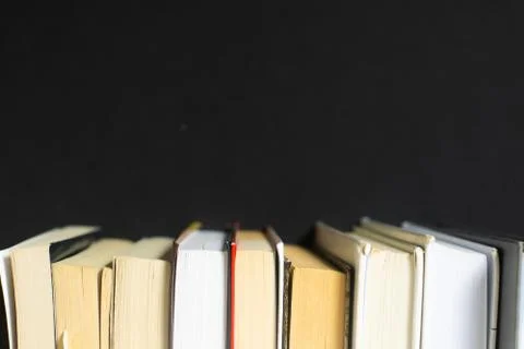 Stack of books on black background Stock Photos