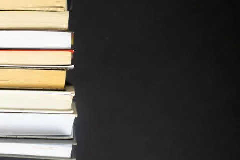 Stack of books on black background Stock Photos