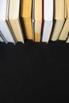 Stack of books on black background 스톡 사진