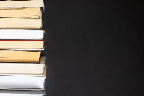 Stack of books on black background Stock Photos