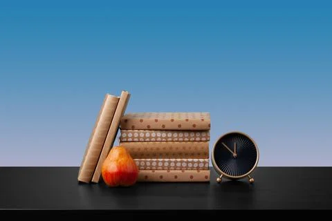 Stack of books on black wooden table Stock Photos
