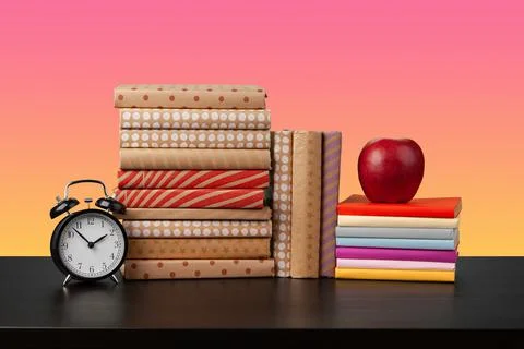 Stack of books on black wooden table 스톡 사진