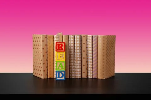 Stack of books on black wooden table Foto stock