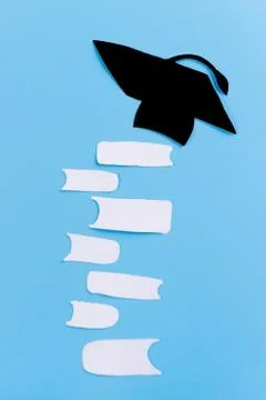 Stack of books on blue background Stock Photos