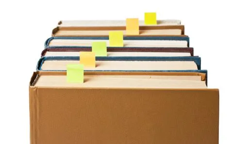 Stack of books with bookmarks 库存照片