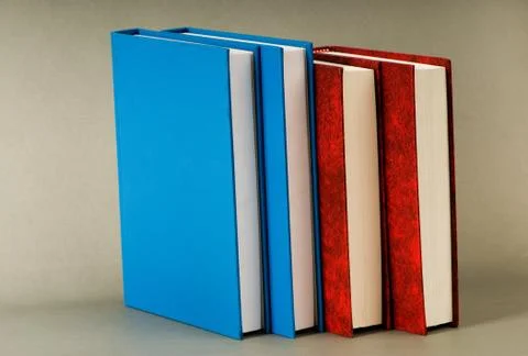 Stack of books on the color background Stock Photos