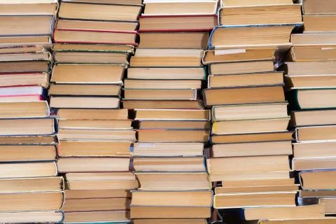 A stack of books with colorful covers. The library or bookstore Foto stock