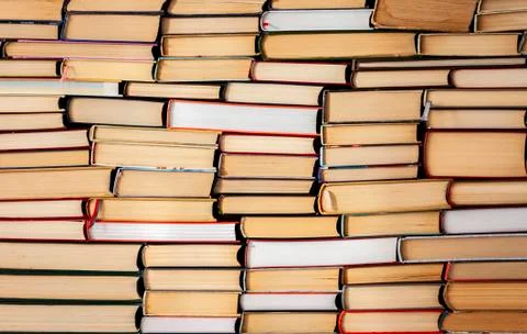 Stack of books education background, many books piles with copy space for text Stock Photos