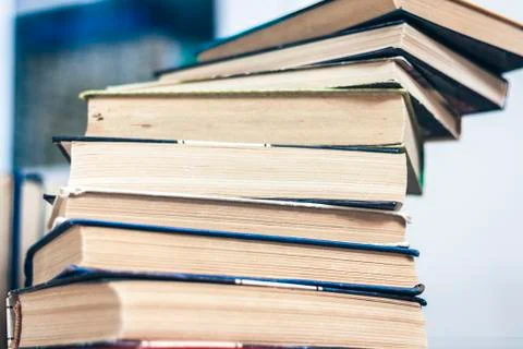 Stack of books education background, many books piles with copy space for tex Stock Photos