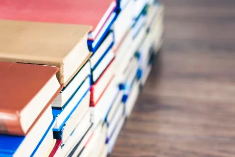 Stack of books education background, many books piles with copy space for tex Stock Photos