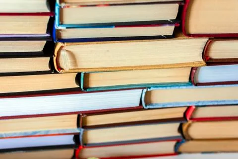 Stack of books education concept background, many books piles . Stock Photos